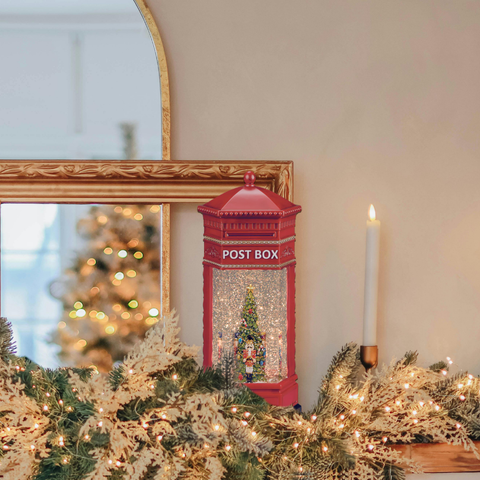 Lit Confetti Swirl Post Box with Nutcrackers around Tree