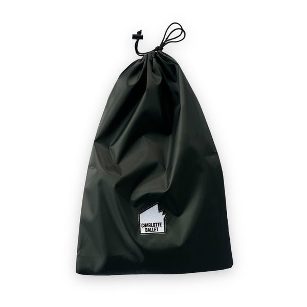  The perfect bag for your needs, the Charlotte Ballet Nylon Shoe Bag is a trusty drawstring bag great for organizing, storing, and carrying your pointe shoes or other needs. Now you can easily access your essentials wherever you go!